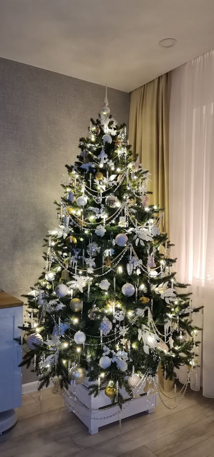New Year's decoration of an artificial spruce tree (220 cm) / عيد الميلاد