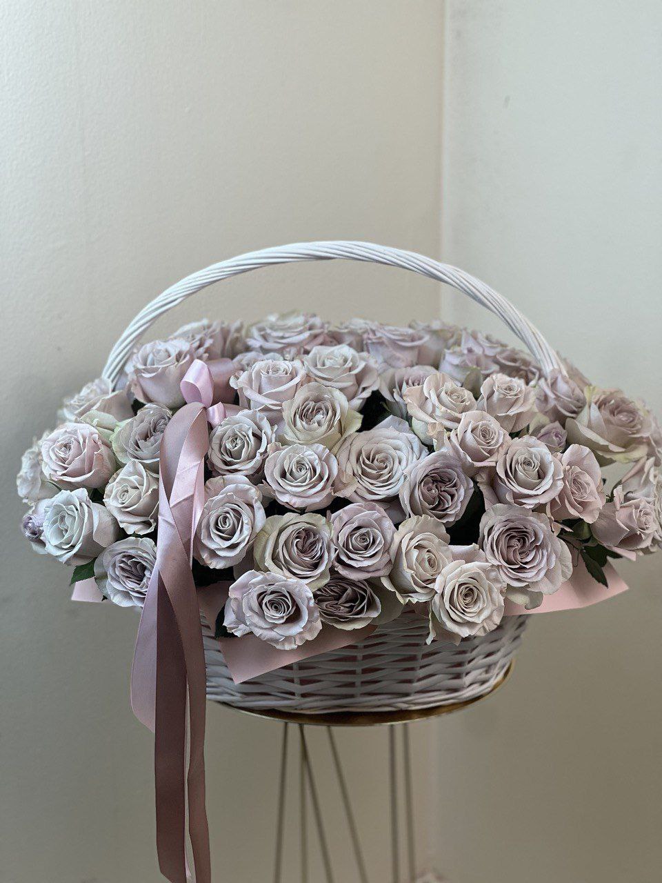 Basket with purple roses