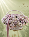 Basket with purple roses