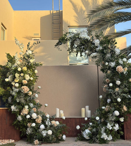 Wedding arch with fresh flowers /  قوس زفاف مزين بالزهور الطازجة